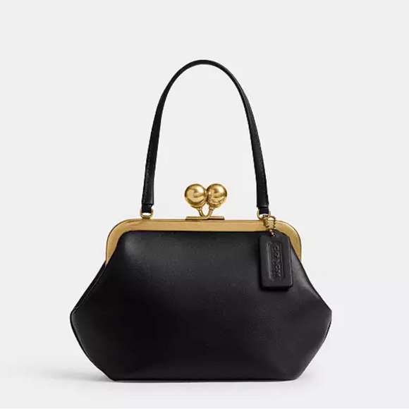 Coach Handbags - Coach Black and Gold Clutch with Heart Clasp